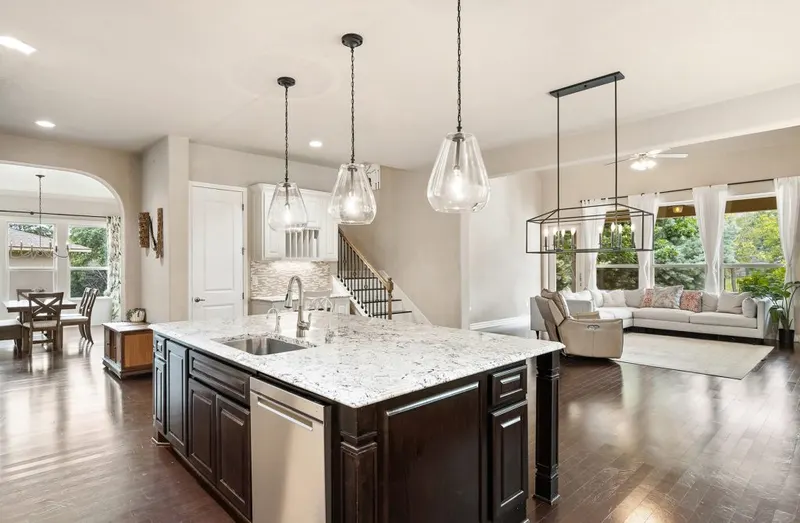 Bright kitchen with pendant lighting wired by CES